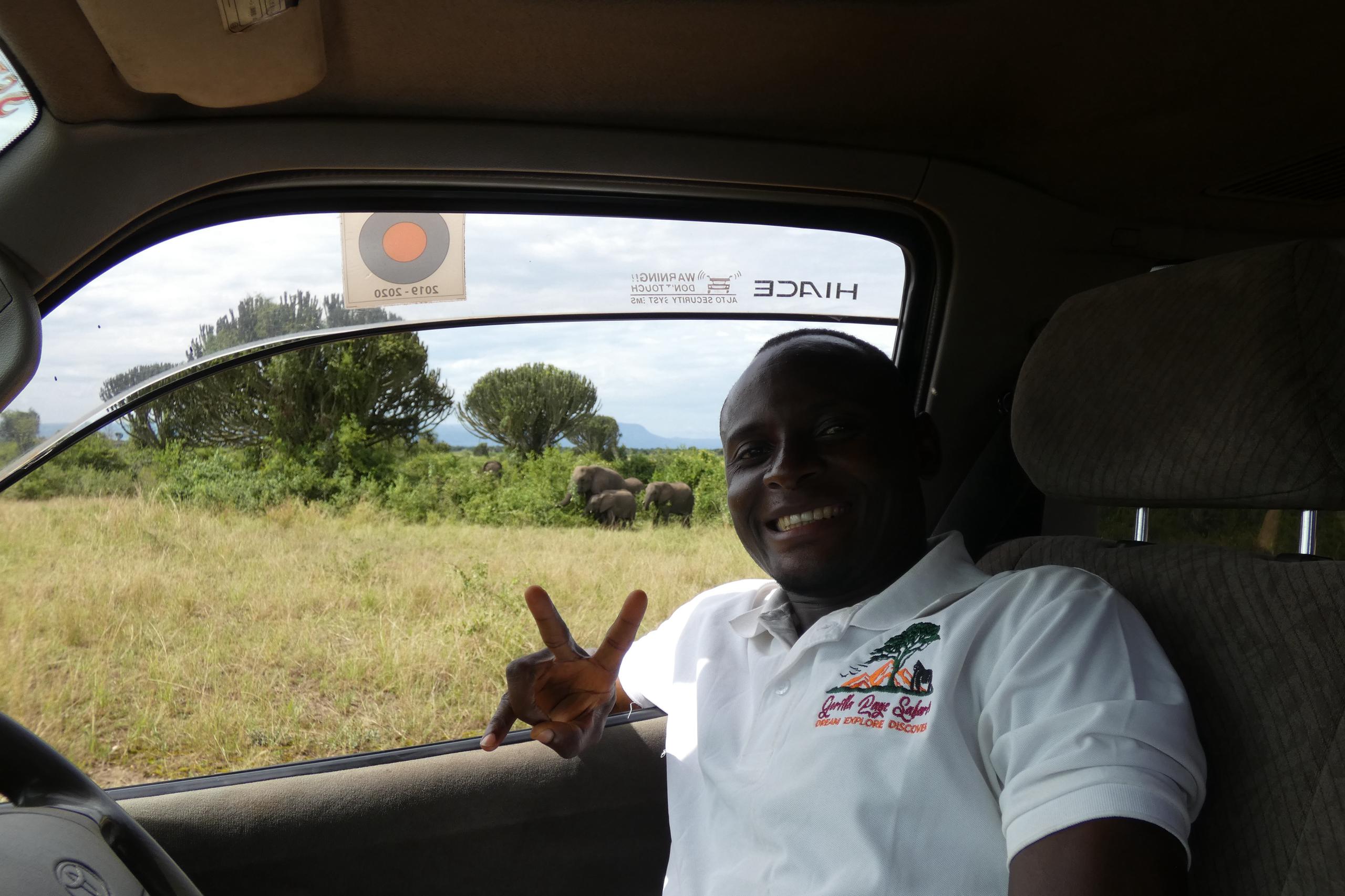 Isaac our guide on a Game drive in Queen Elizabeth National Park